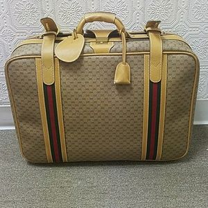 Authentic Gucci travel luggage case